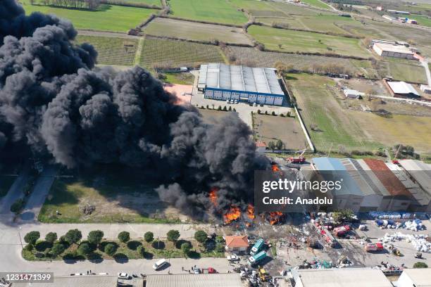 Drone photo shows smoke rises after a fire broke out at the waste storage area of the recycling facility at Yunusemre district in Manisa, Turkey on...