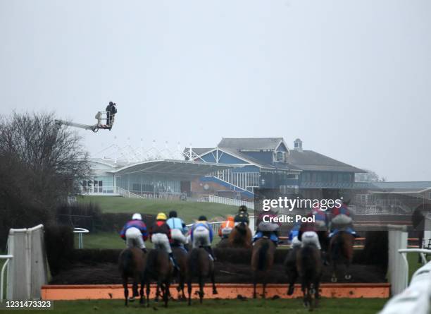 Runners and riders in the Cottesmore "Grassroots" Maiden Hunters' Chase at Leicester Racecourse on March 2, 2021 in Leicester, England.