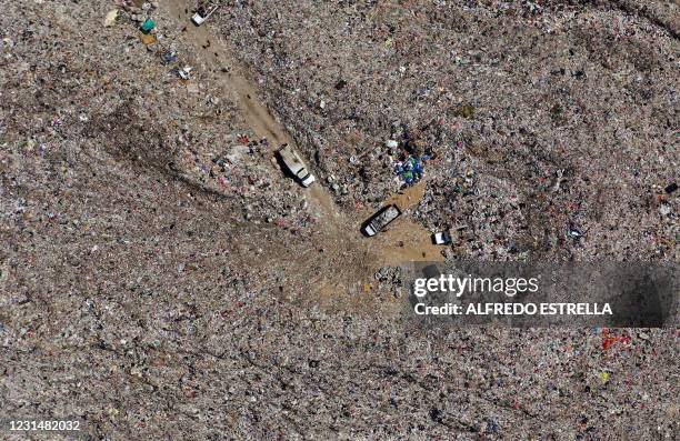 Aerial view of the municipal garbage dump in Chimalhuacan, Mexico state, Mexico, on February 24, 2021. - The COVID-19 pandemic made schools close...
