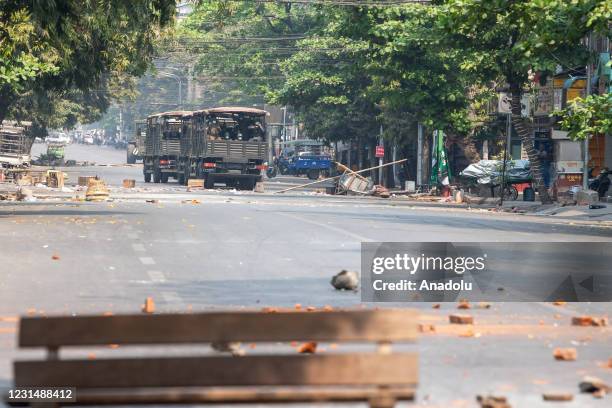 Soldiers block the road during a protest against the military coup in Mandalay, Myanmar on March 3, 2021.