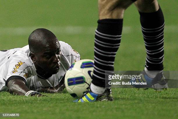 Juninho of Vasco struggles for the ball with Marcelo Nicacio of Ceara during a match as part of Serie A 2011 at Sao Januario stadium on August 31,...