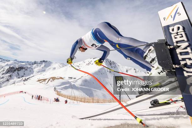 Italy's Emanuele Buzzi starts for the first training session of the men's downhill race during the FIS Ski Alpine World Cup in Saalbach-Hinterglemm,...