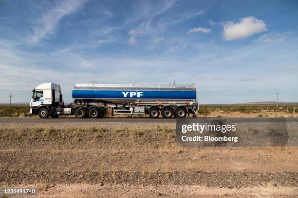Truck drives near Plaza Huincul, Neuquen province, Argentina, on Tuesday, March 2, 2021. YPF, Argentinas state-run oil company, needs to come up with...