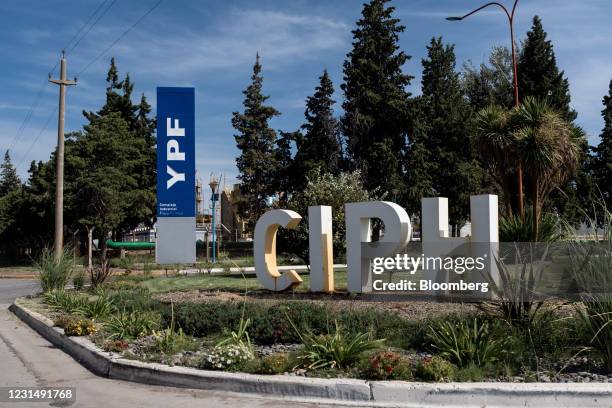 Signage at a YPF SA facility in Plaza Huincul, Neuquen province, Argentina, on Tuesday, March 2, 2021. YPF, Argentinas state-run oil company, needs...