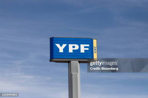 Signage at a at a YPF SA gas station in Plaza Huincul, Neuquen province, Argentina, on Tuesday, March 2, 2021. YPF, Argentinas state-run oil company,...