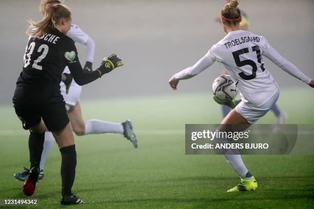 Rosengaard's Sanne Troelsgaard scores past St Polten's goalkeeper Isabella Kresche during the UEFA Women's Champions League round of 16, first-leg...