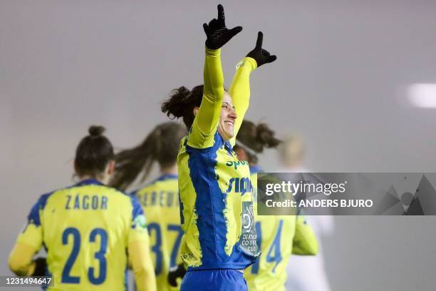 Polten's Mateja Zver celebrates scoring with her team-mates during the UEFA Women's Champions League round of 16, first-leg football match between FC...