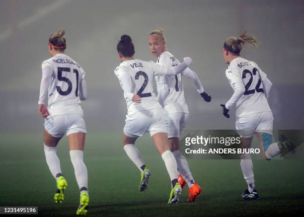 Rosengaard's Caroline Seger celebrates scoring with his team-mates during the UEFA Women's Champions League round of 16, first-leg football match...