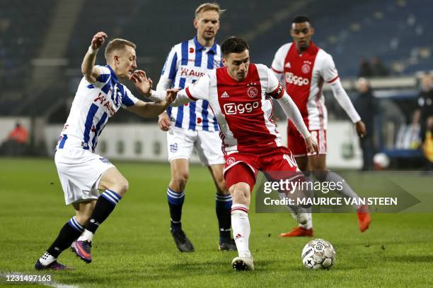 Tibor Halilovic of sc Heerenveen fights for the ball with Dusan Tadic or Ajax during the KNVB Cup semi-final match between sc Heerenveen and Ajax...