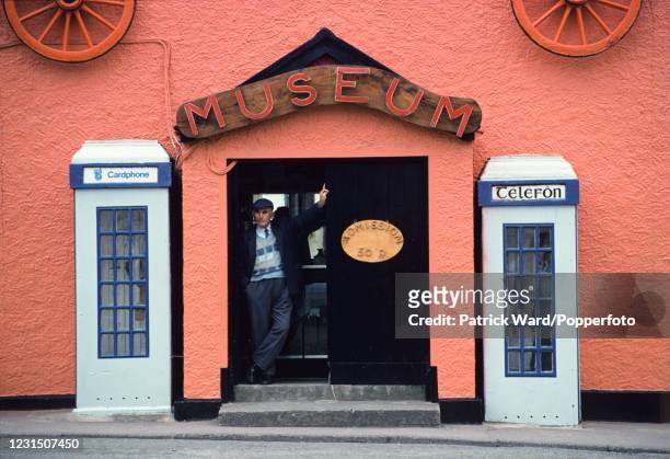 The colourful Village Museum flanked by telephone boxes in Sneem, County Kerry, Ireland, circa August 1996.