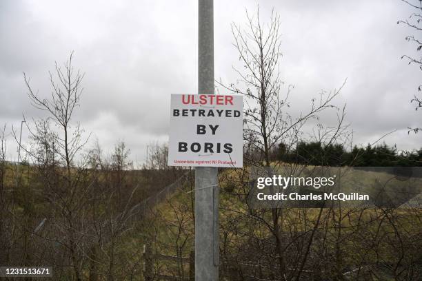 Poster erected by Unionists against NI Protocol can be seen near Larne harbour on March 4, 2021 in Larne, Northern Ireland. The Loyalist Communities...