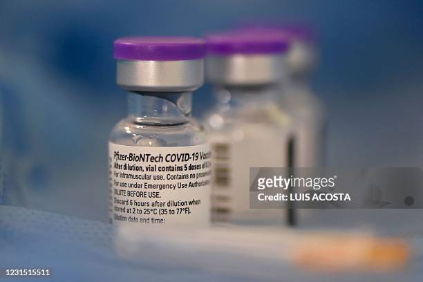 Picture of vials of the Pfizer-BioNTech vaccine against COVID-19 taken as elderly people are being inoculated amid the novel coronavirus pandemic, at...