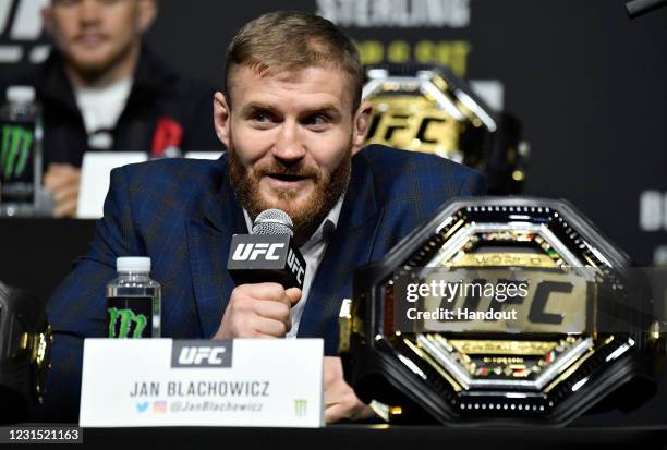 In this handout image provided by UFC, Jan Blachowicz of Poland interacts with media during the UFC 259 press conference at UFC APEX on March 04,...