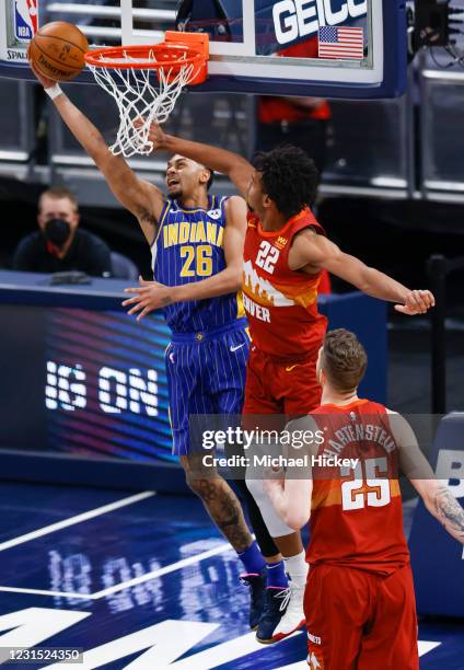 Jeremy Lamb of the Indiana Pacers shoots the ball against Zeke Nnaji of the Denver Nuggets during the second half at Bankers Life Fieldhouse on March...