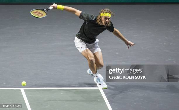 Greece' Stefanos Tsitsipas returns the ball to Russia's Karen Khachanov on the fifth day of the ABN AMRO World Tennis Tournament in Rotterdam, The...