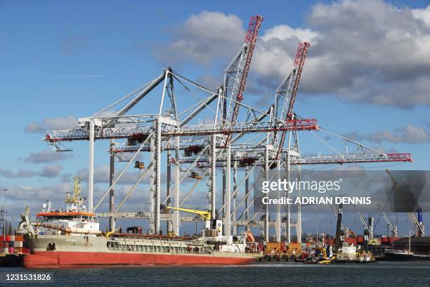 The Medway, a trailing suction hopper dredger, operates in the Port of Southampton, on the south coast of England, on March 5, 2021. - Britain's...
