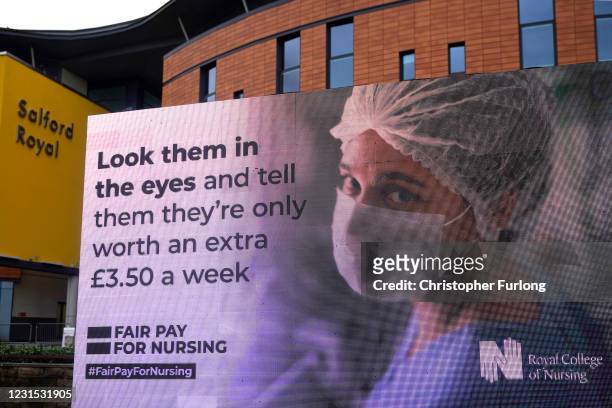 Responding to the government's NHS pay proposal, the Royal College of Nursing has released a digital billboard message showing the image of a nurse...