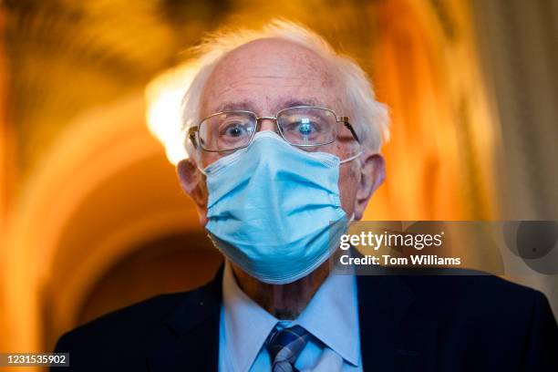 Sen. Bernie Sanders, I-Vt., is seen outside the chamber as the Senate debates the coronavirus relief package on Friday, March 5, 2021.