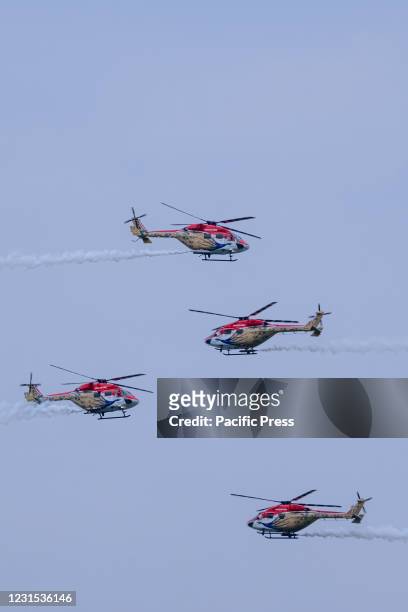 Indian Air Force Advanced Light Helicopter aerobatic team 'Sarang' performs during the Last day of 70th anniversary celebrations of the Sri Lankan...