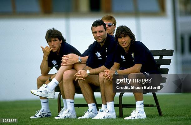 Gianfranco Zola, Luigi Appolini, Hristo Stoichkov and Antonio Benarrivo of Parma AC relax on a bench before a Friendly match against Rovereto at the...