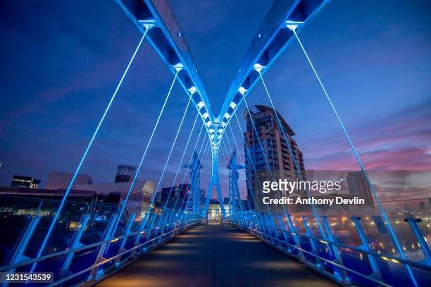 General view Millennium Bridge, a lift bridge between Salford and Trafford close to Media City on March 25, 2020 in Salford, England.
