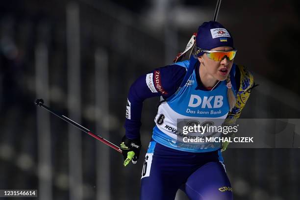 Ukraine's Yuliia Dzhima competes to place second in the women's 7,5 km sprint event of the IBU Biathlon World Cup in Nove Mesto na Morave, Czech...