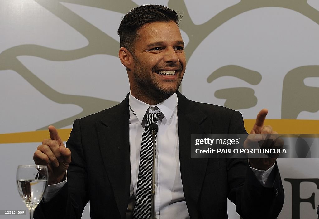 Puerto Rican Singer Ricky Puerto Rican singer Ricky Martin gestures during a press conference ...