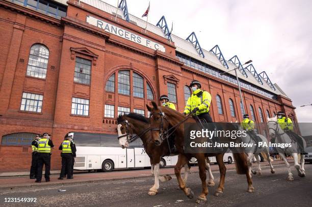 Mounted Police presence outside the ground ahead of the Scottish Premiership match at Ibrox Stadium, Glasgow. Picture date: Saturday March 6, 2021.