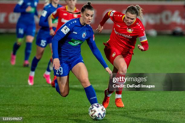 Selina Cerci of 1.FFC Turbine Potsdam and Ann-Kathrin Vinken of TSV Bayer 04 Leverkusen battle for the ball during the Flyeralarm Frauen Bundesliga...