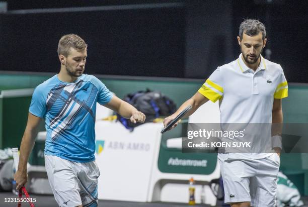 Croatia's Nicola Mektic and Mate Pavic are seen during their Rotterdam ATP tournament men's double semi-final tennis match against France's Jeremy...