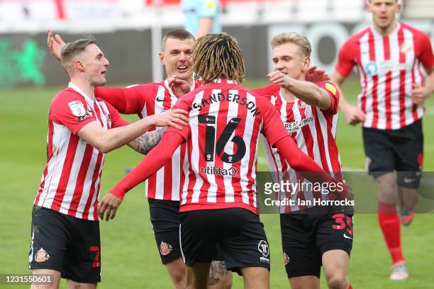Dion Sanderson of Sunderland celebrates with his team after he scores the opening goal during the Sky Bet League One match between Sunderland and...