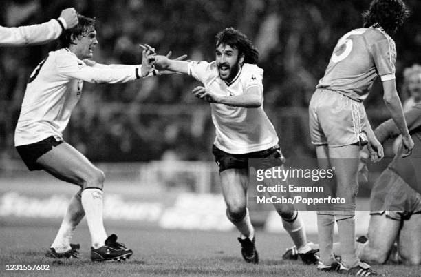 Ricardo Villa of Tottenham Hotspur celebrates with teammate Glenn Hoddle after scoring the winning goal in the FA Cup Final Replay between Tottenham...