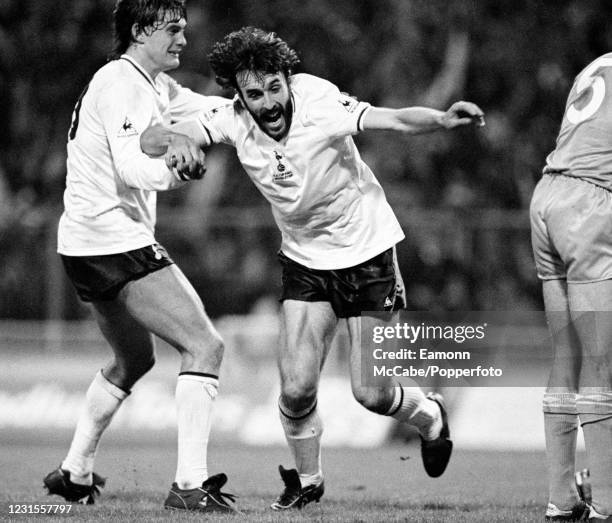 Ricardo Villa of Tottenham Hotspur celebrates with teammate Glenn Hoddle after scoring the winning goal in the FA Cup Final Replay between Tottenham...