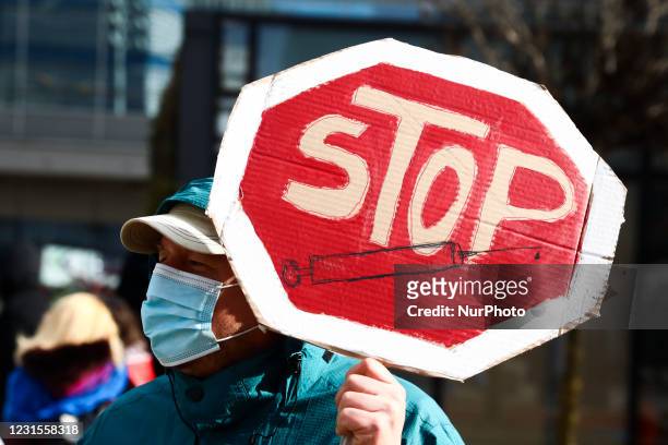 Anti-vaccination coronavirus sceptics attend Anti-Covid Freedom March in Katowice, Poland on March 6, 2021. Demonstrators gathered to protest against...