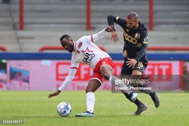 Mouscron, Belgium Medhi Carcela midfielder of Standard Liege and Fabrice Olinga forward of Mouscron during the Jupiler Pro League match between Royal...