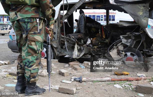 Afghan security officials inspect the scene of blast in Kabul, Afghanistan on March 7, 2021. A bomb attached to a minibus exploded in the capital of...