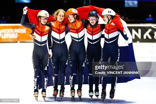 Team Netherlands celebtrates after winning the final 3000 meters relay on the final day of the ISU World Short Track Speed Skating Championships at...