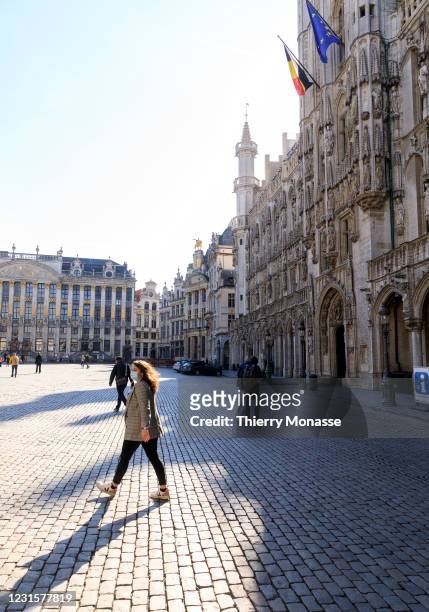 Despite the coronavirus crisis, people enjoy a warm Saturday afternoon on March 6, 2021 in Brussels, Belgium. On March 5 the Federal Government and...
