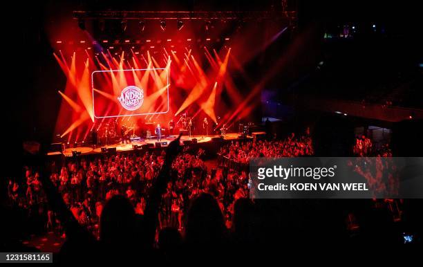 Visitors to the Ziggo Dome attend a performance by Dutch singer Andre Hazes part of a series of trial events in which Fieldlab is investigating how...