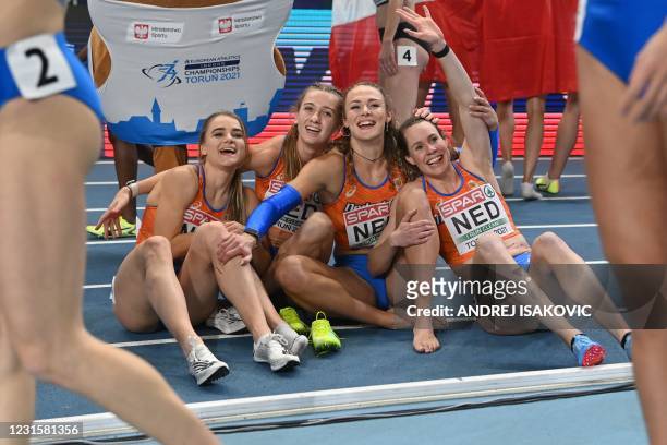 Team Netherlands celebrates winning the women's 4x400m relay at the 2021 European Athletics Indoor Championships in Torun on March 7, 2021.