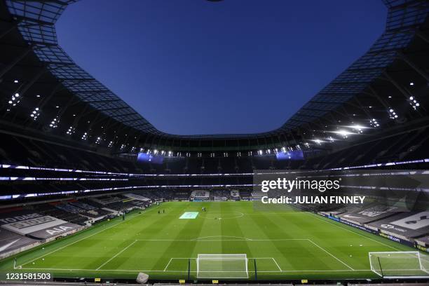 The pitch is seen under the floodlights ahead of the English Premier League football match between Tottenham Hotspur and Crystal Palace at Tottenham...