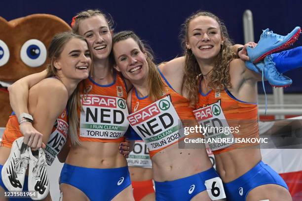 Team Netherlands celebrates winning the women's 4x400m relay at the 2021 European Athletics Indoor Championships in Torun on March 7, 2021.