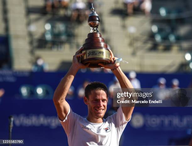 Diego Schwartzman of Argentina lifts the champions trophy after winning a Men's Singles Final match against Francisco Cerundolo of Argentina as part...