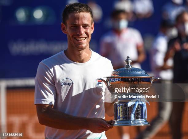 Diego Schwartzman of Argentina poses with the Centenary Cup trophy after winning a Men's Singles Final match against Francisco Cerundolo of Argentina...