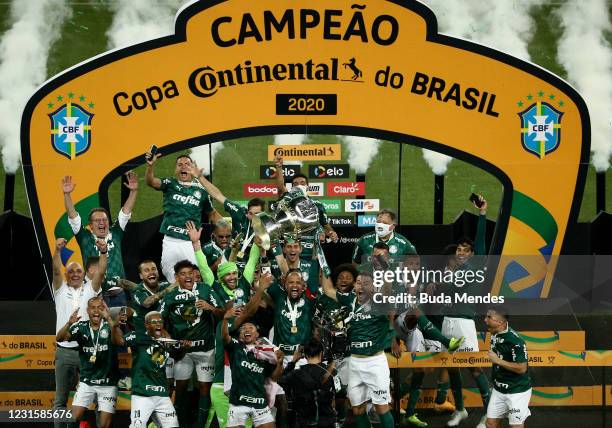 Felipe Melo of Palmeiras lifts the champions trophy after winning the final of 2020 Copa do Brasil between Palmeiras and Gremio at Allianz Parque on...