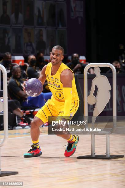 Chris Paul of the Phoenix Suns dribbles during the Taco Bell Skills Challenge as part of 2021 NBA All Star Weekend on March 7, 2021 at State Farm...