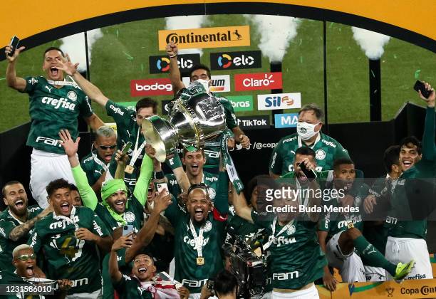 Felipe Melo of Palmeiras lifts the champions trophy after winning the final of 2020 Copa do Brasil between Palmeiras and Gremio at Allianz Parque on...