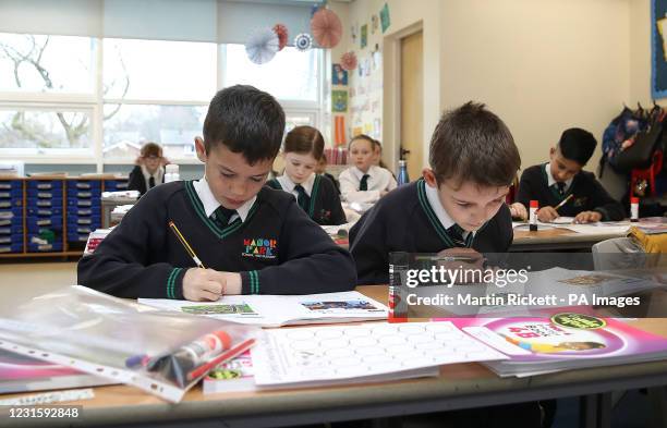 Year 4 children back in the classroom at Manor Park School and Nursery in Knutsford, Cheshire, as pupils in England return to school for the first...