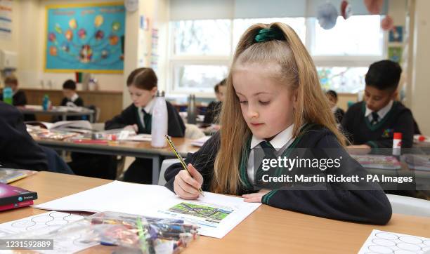 Year 4 children back in the classroom at Manor Park School and Nursery in Knutsford, Cheshire, as pupils in England return to school for the first...