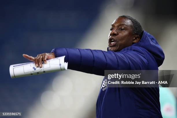 Terry Connor the assistant head coach / manager of Cardiff City points during the Sky Bet Championship match between Huddersfield Town and Cardiff...